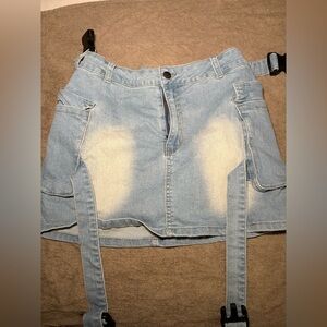 Y2K Cross cross mini skirt. With buckles